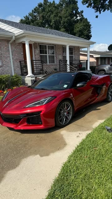 Red C8 Corvette with a deep gloss finish after ceramic wax from MJ's Mobile Detailing